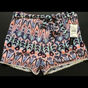 Women’s multi colored lined shorts.